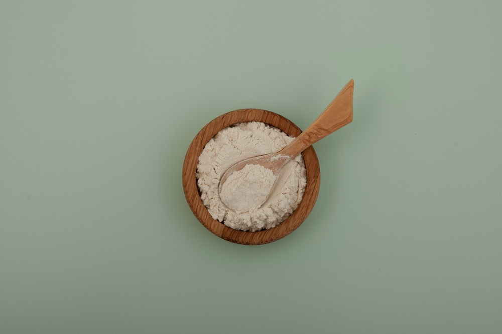 guar gum in a wooden bowl